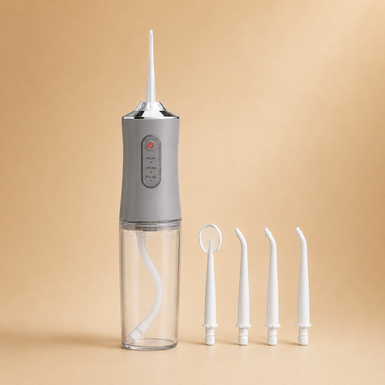 Irrigador Dental Portátil gris con cuatro boquillas